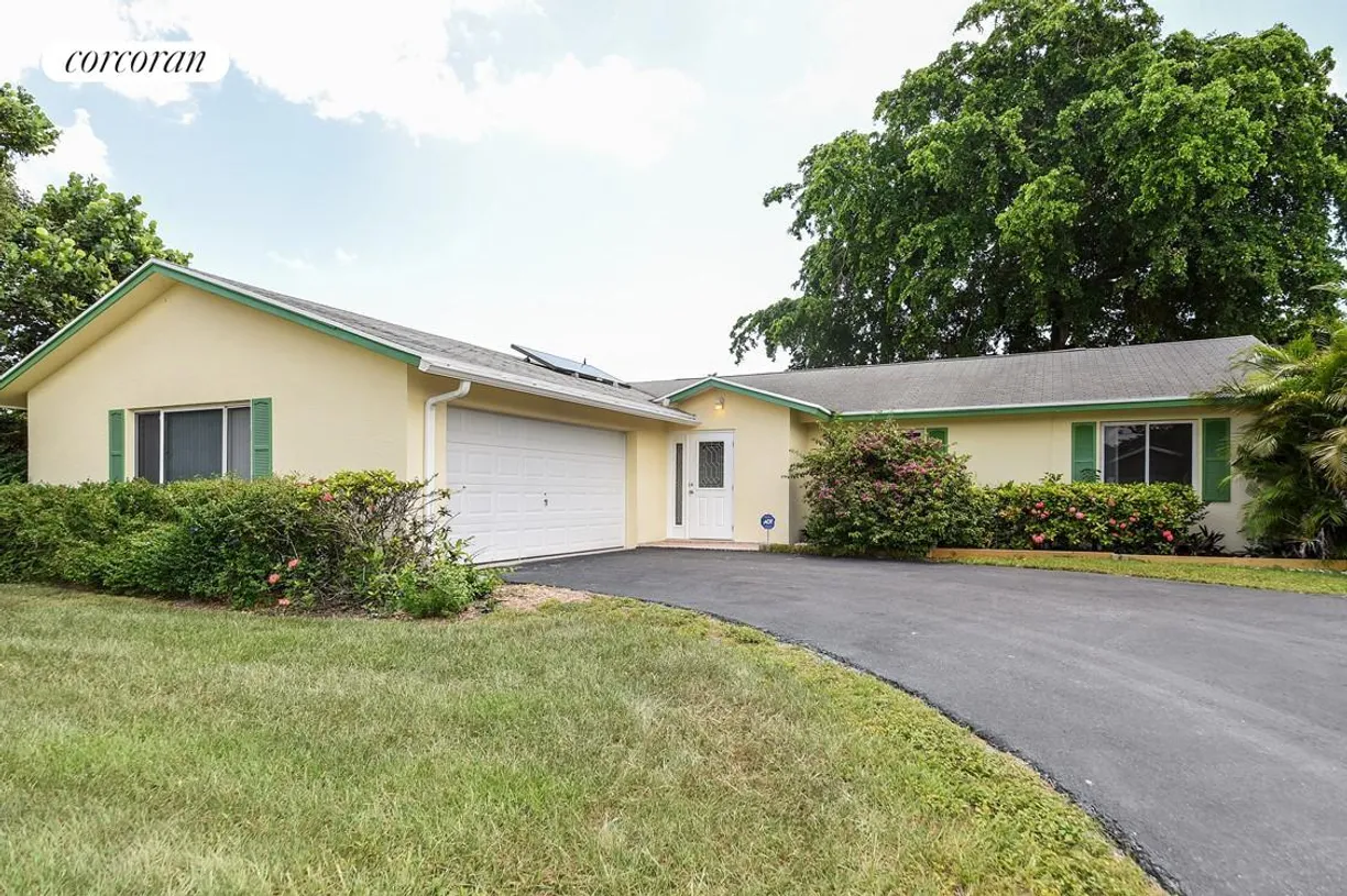 South Florida Real Estate | View 1136 Woodcrest Road | 3 Beds, 2 Baths