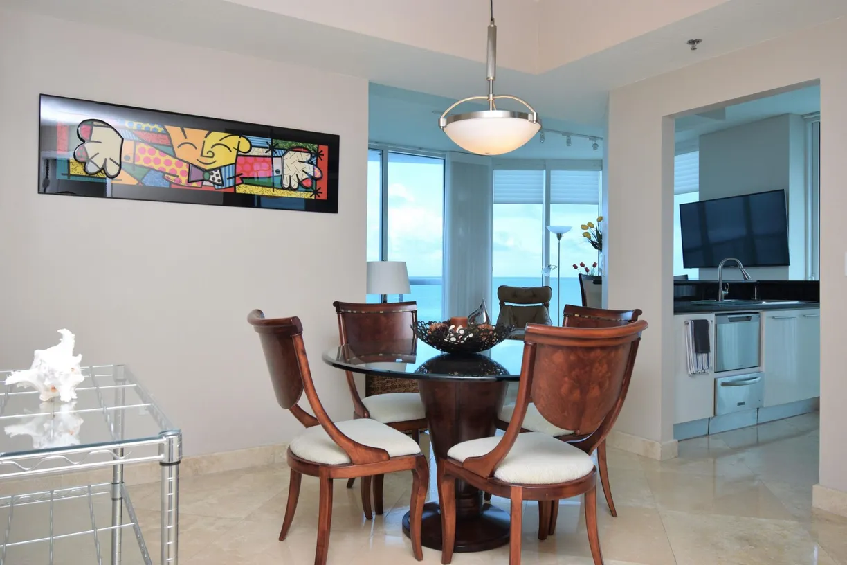 South Florida Real Estate | View 6515 Collins avenue Unit 903 | Dining Room