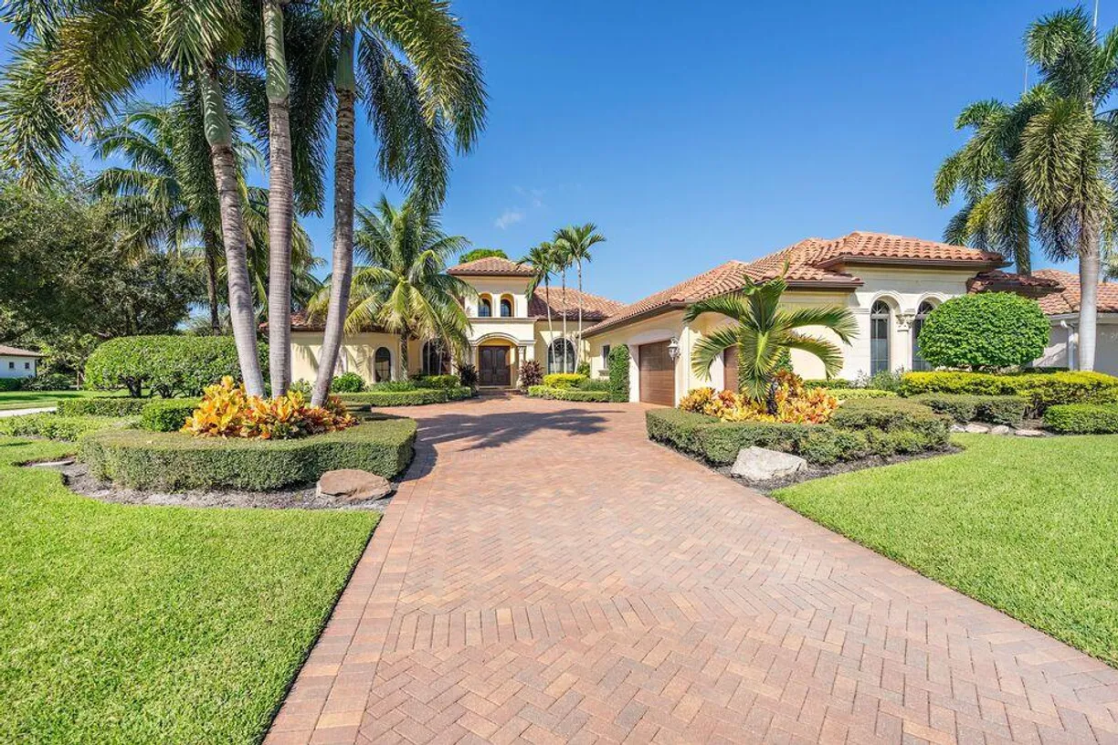 South Florida Real Estate | View 1663 Breakers West Boulevard | 4 Beds, 4 Baths