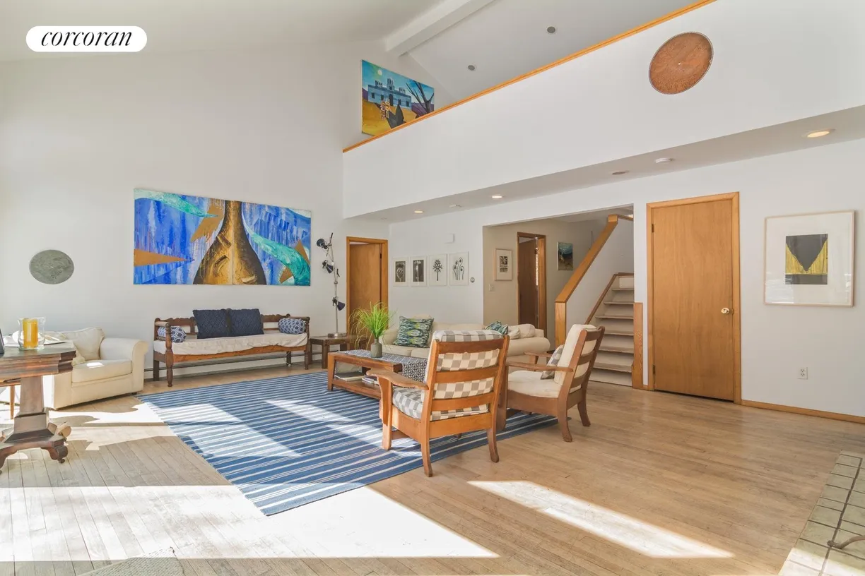 The Hamptons Real Estate | View 28 Cobbetts Lane | Living room with loft