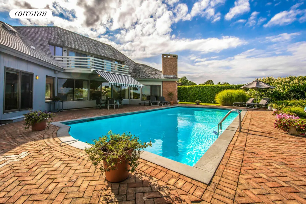 The Hamptons Real Estate | View 292 W Lake Drive | heated pool/patio areas
