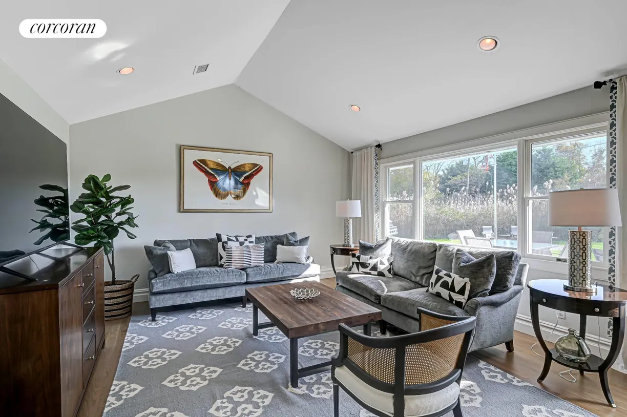 The Hamptons Real Estate | View 31B Club Lane | Living Room with New TV