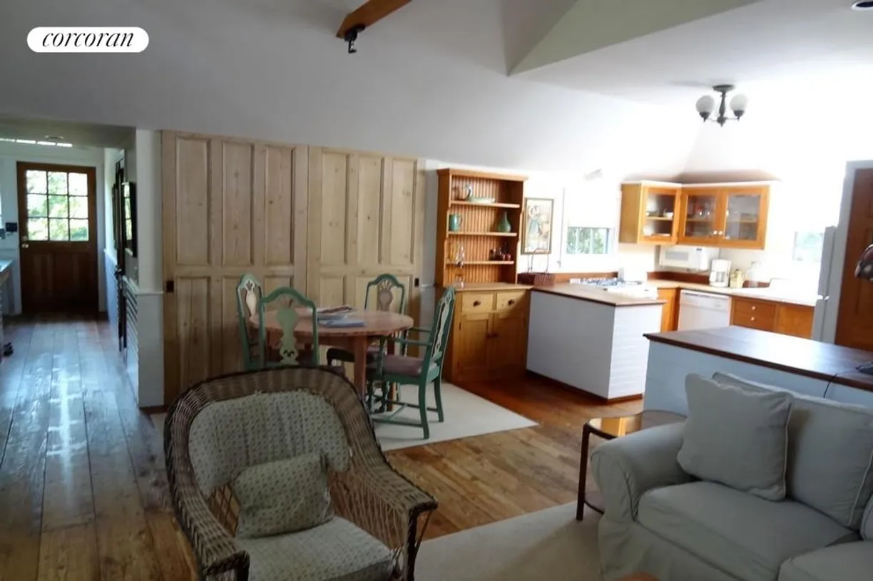 The Hamptons Real Estate | View 63 Treasure Island Drive | living room toward front door