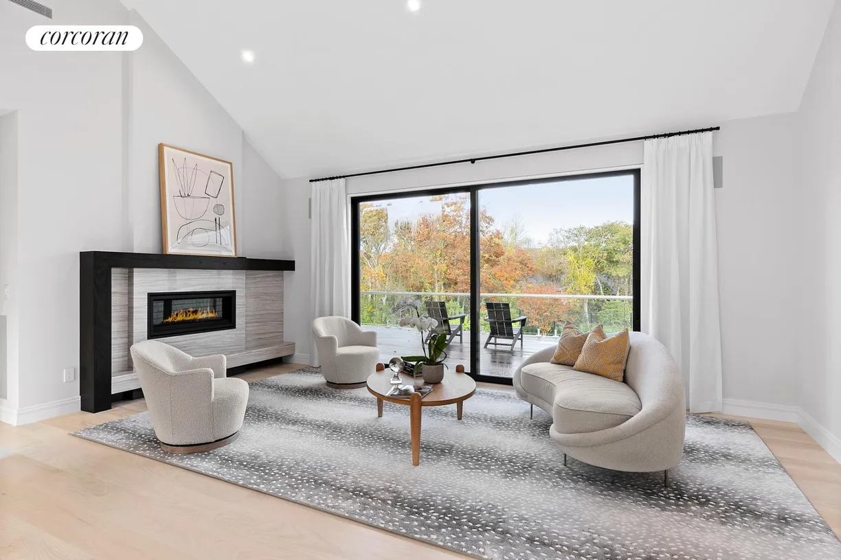 The Hamptons Real Estate | View 12 Eileen's Path | Sitting Area w/ Private Balcony | View 24