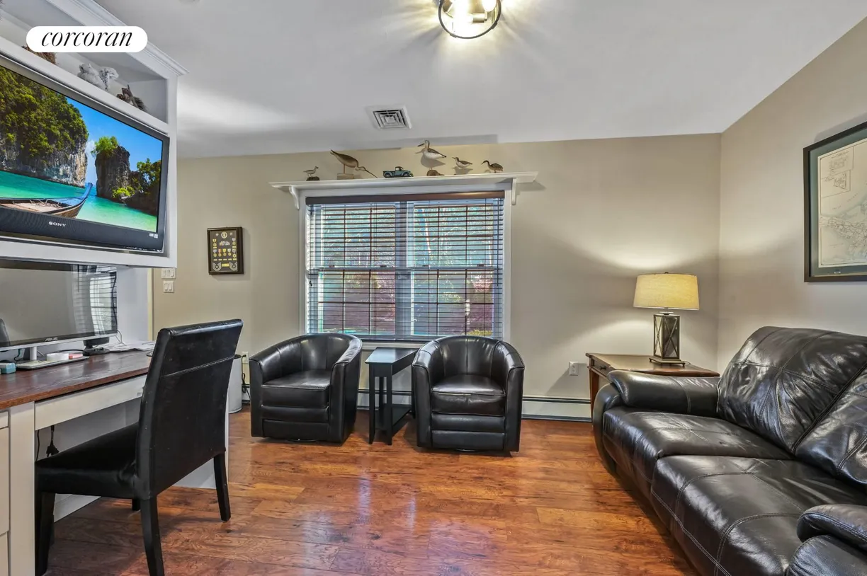 The Hamptons Real Estate | View 119 Straight Path | Stylish Den | View 6