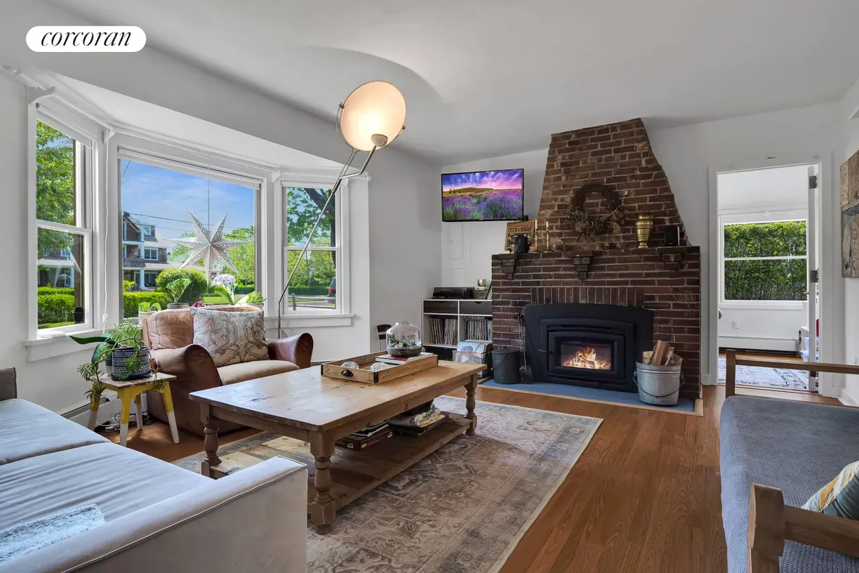 The Hamptons Real Estate | View 101 Potunk Lane | TV and Fireplace Virtually Enhanced