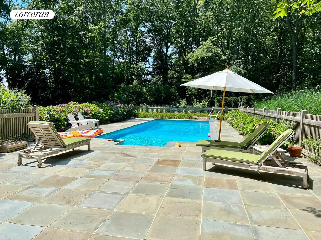 The Hamptons Real Estate | View 22 Glenwood Lane | Pool with large patio