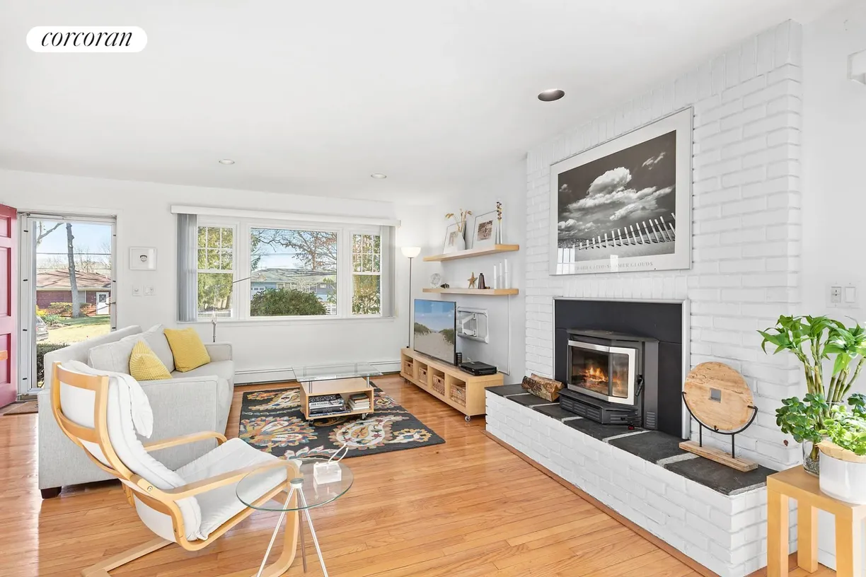 The Hamptons Real Estate | View 3 Crestview Drive | Living Room with Fireplace | View 3