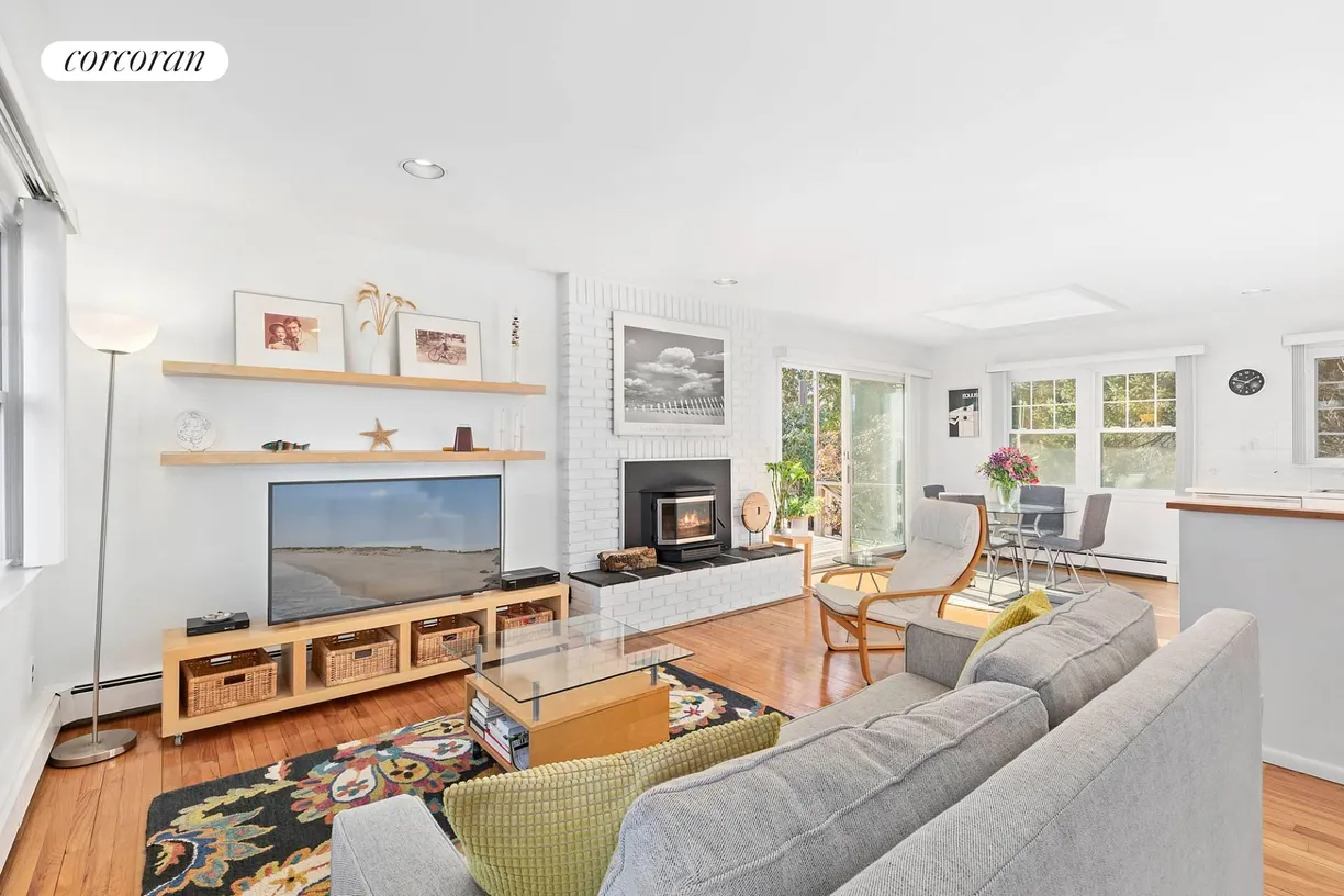 The Hamptons Real Estate | View 3 Crestview Drive | Living Room with Fireplace | View 4