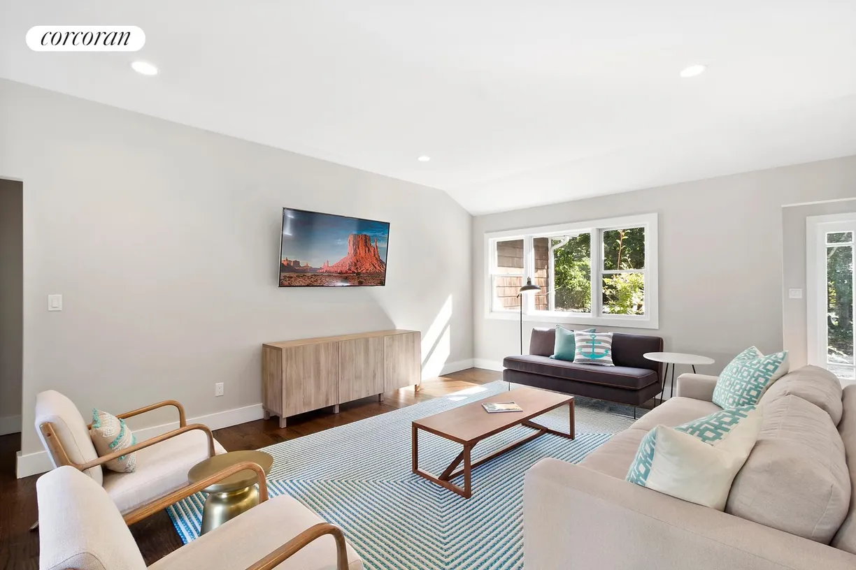 The Hamptons Real Estate | View 25 Shadyrest Drive | Living Room Open to Kitchen