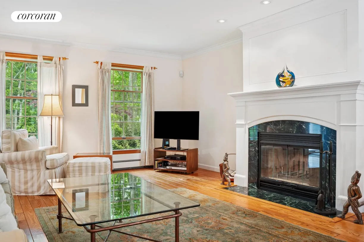 The Hamptons Real Estate | View 330 Sprig Tree Path | Fireplace