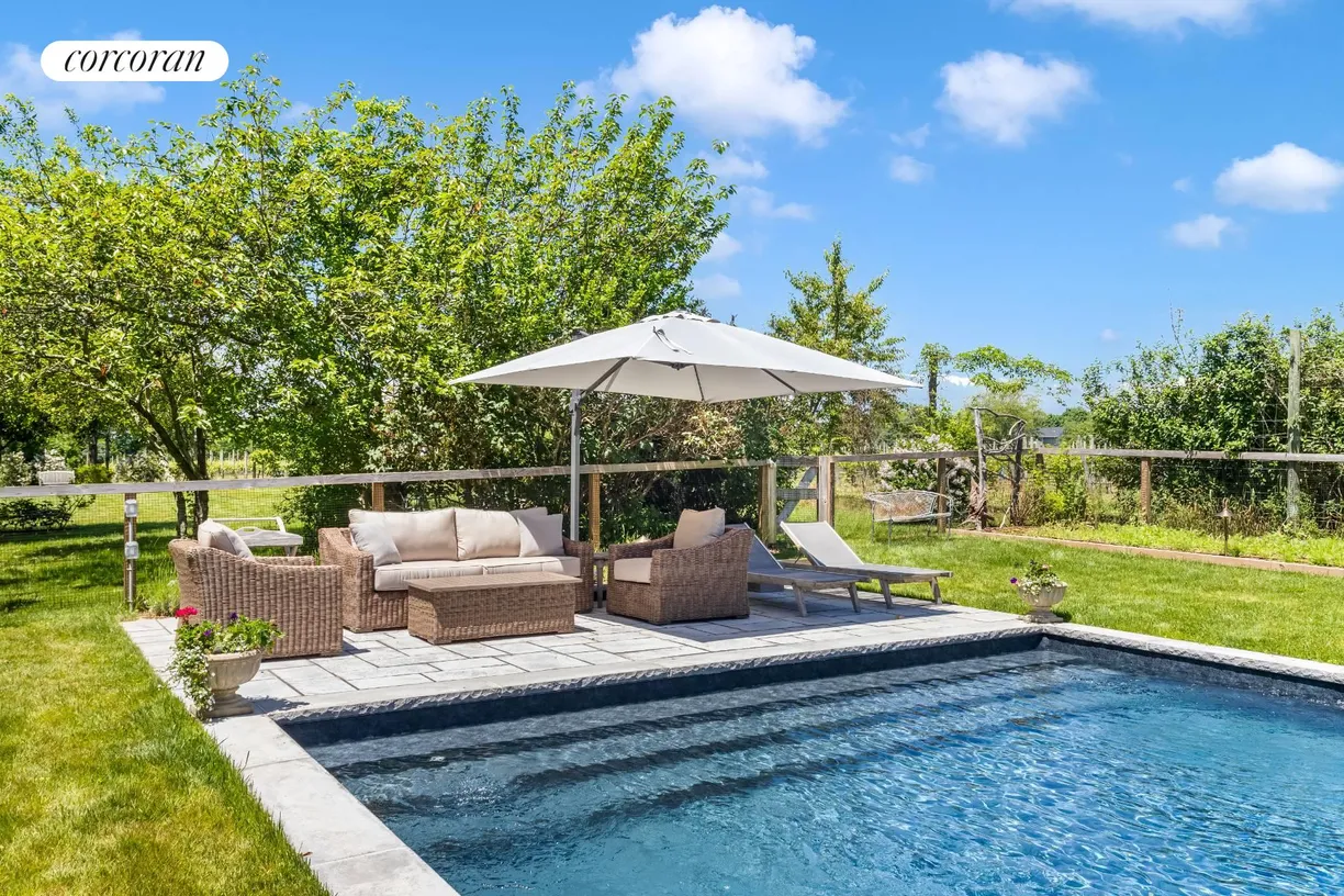 The Hamptons Real Estate | View 1100 Alvahs Lane | 20x40 Heated Vinyl Pool with Lounge