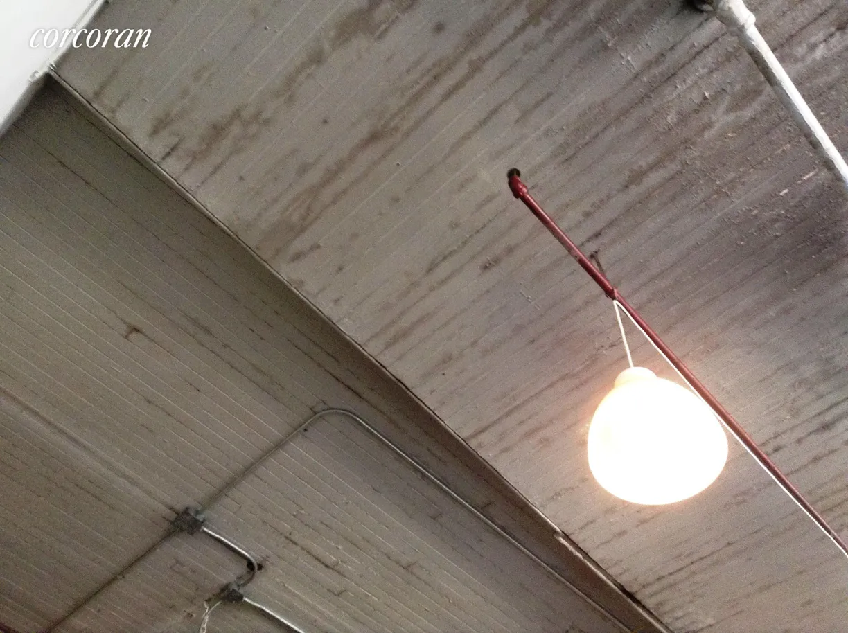 New York City Real Estate | View 705 Driggs Avenue, 5 | Tin and Wood Ceilings 14 ft High