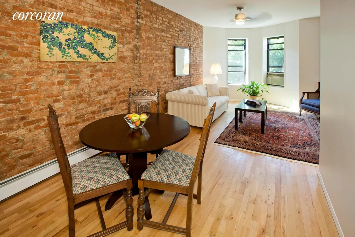 New York City Real Estate | View 15A Berkeley Place, 3B | Separate dining area with exposed brick 