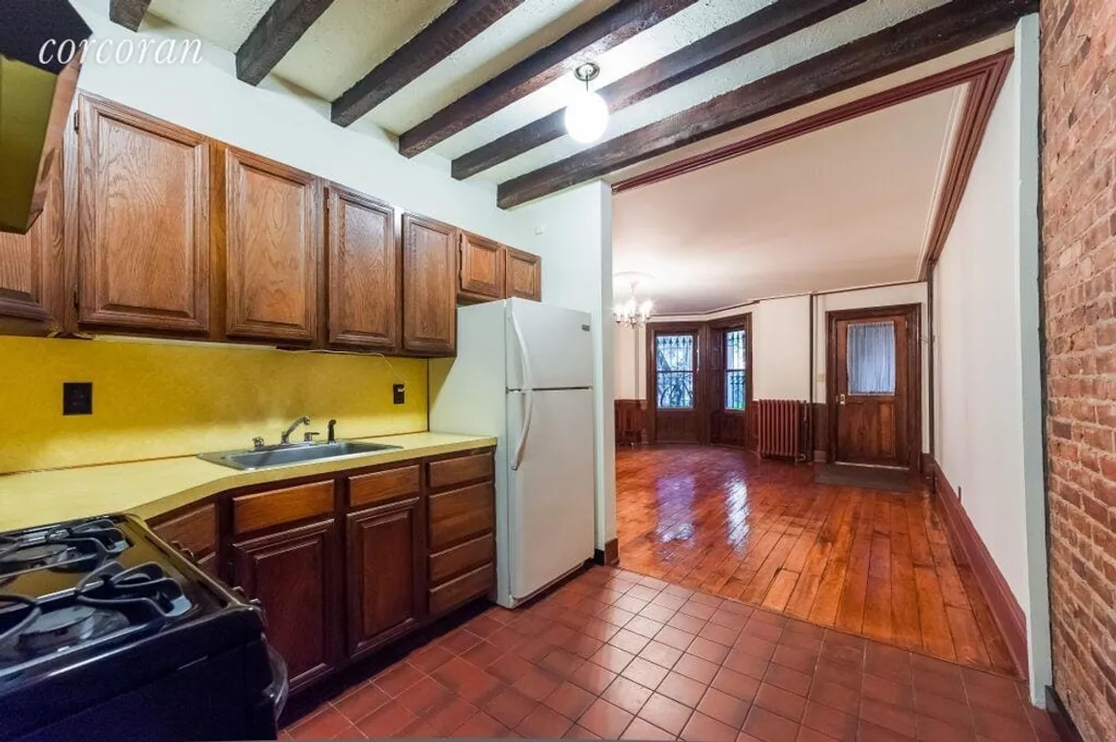 New York City Real Estate | View 100 Park Place, Garden | Exposed Brick and Beamed Ceiling