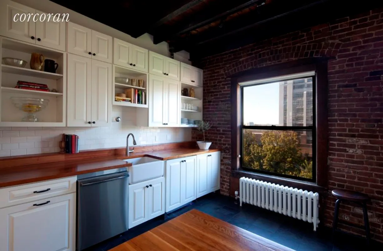 New York City Real Estate | View 32 Willow Place, 9 | Vaulted beamed ceiling & Exposed Brick