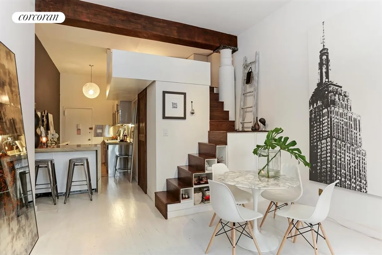 New York City Real Estate | View 23 Waverly Place, 3R | Breakfast bar and storage under the staircase