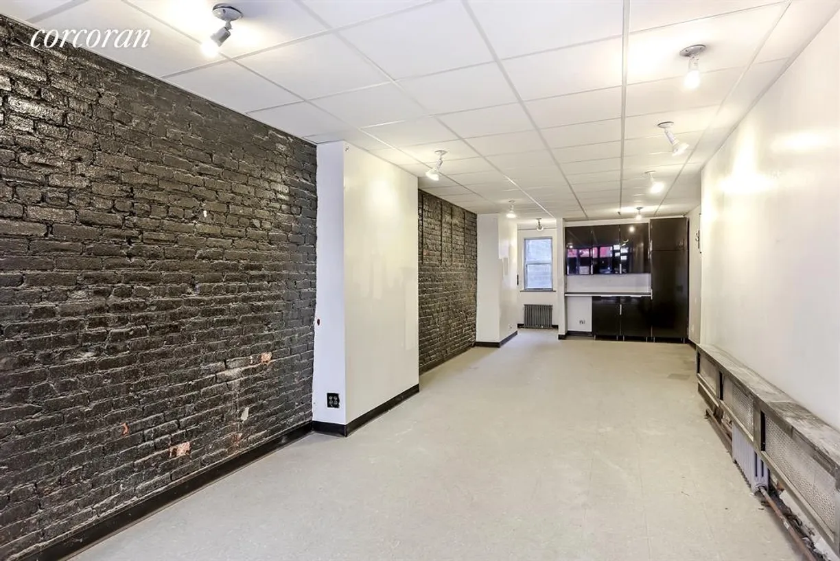 New York City Real Estate | View 183 Avenue B | Beautiful exposed brick and powder room in retail