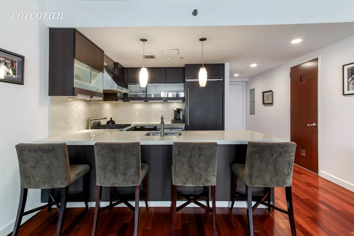 New York City Real Estate | View 50 West 15th Street, 2C | Open Kitchen with Breakfast Bar 