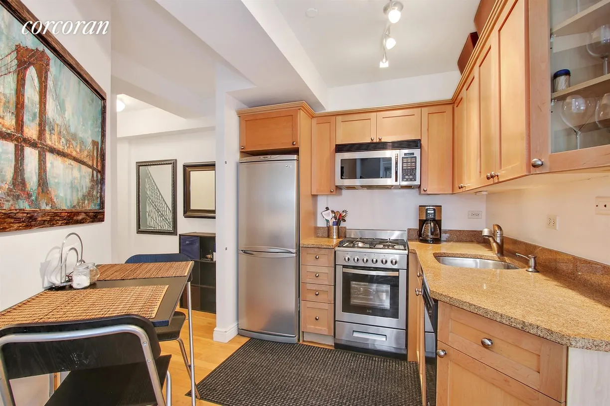New York City Real Estate | View 435 East 76th Street, 2E | Open granite kitchen with NEW applinanes