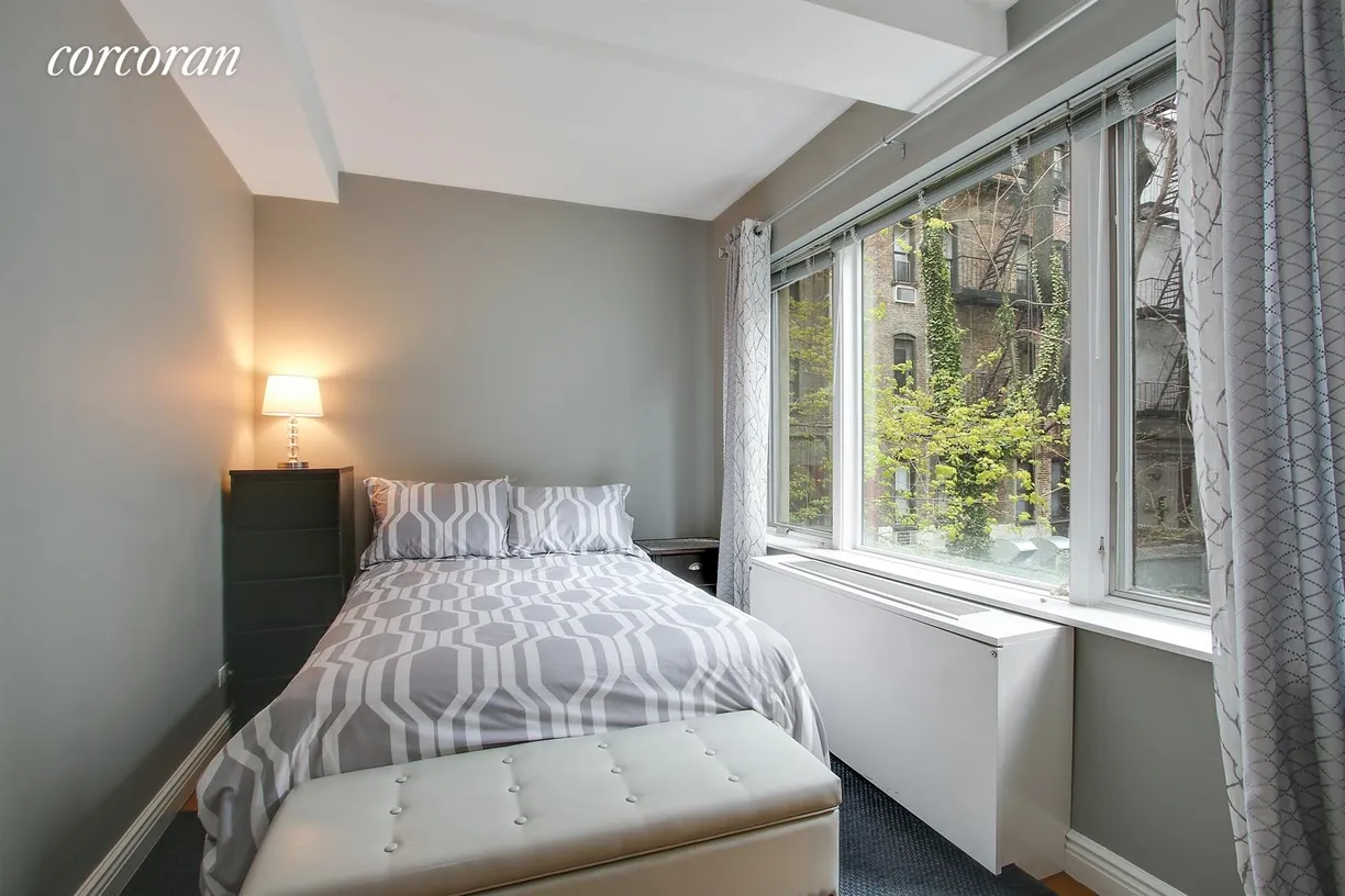 New York City Real Estate | View 435 East 76th Street, 2E | Full second bedroom with garden views