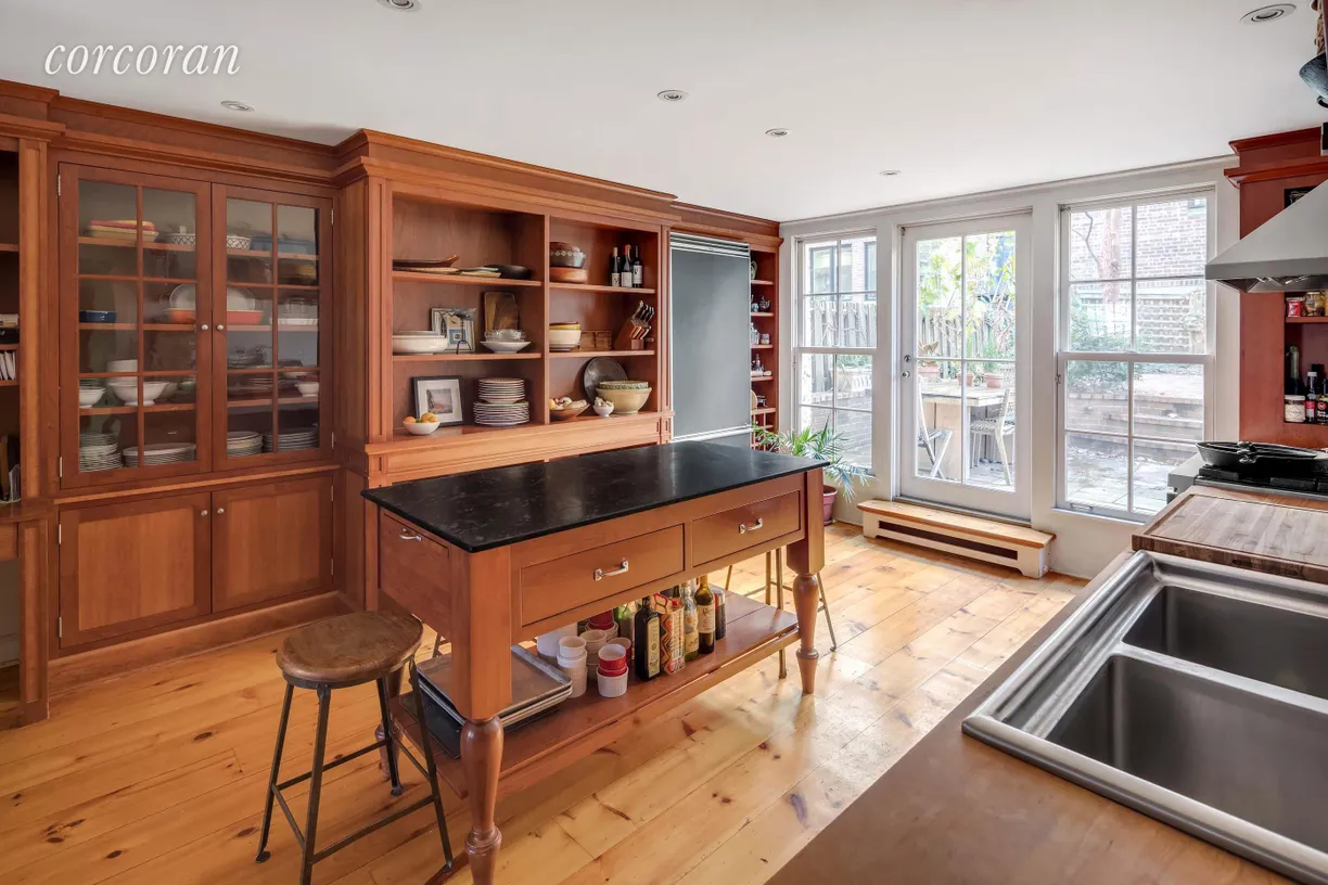 New York City Real Estate | View 67 Joralemon Street | Kitchen walks out to garden