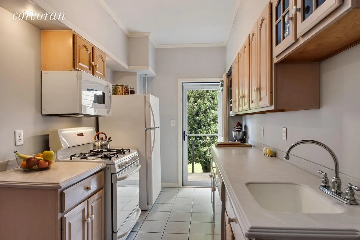 New York City Real Estate | View 110 Vanderbilt Street | Bright kitchen leading to your backyard