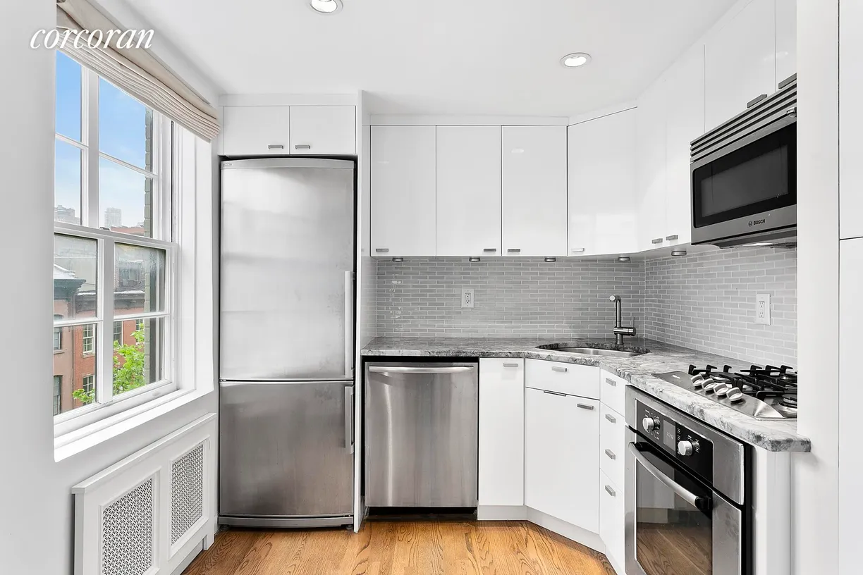 New York City Real Estate | View 362 West 20th Street, 4 | Immaculately Renovated Marble & Stainless Kitchen