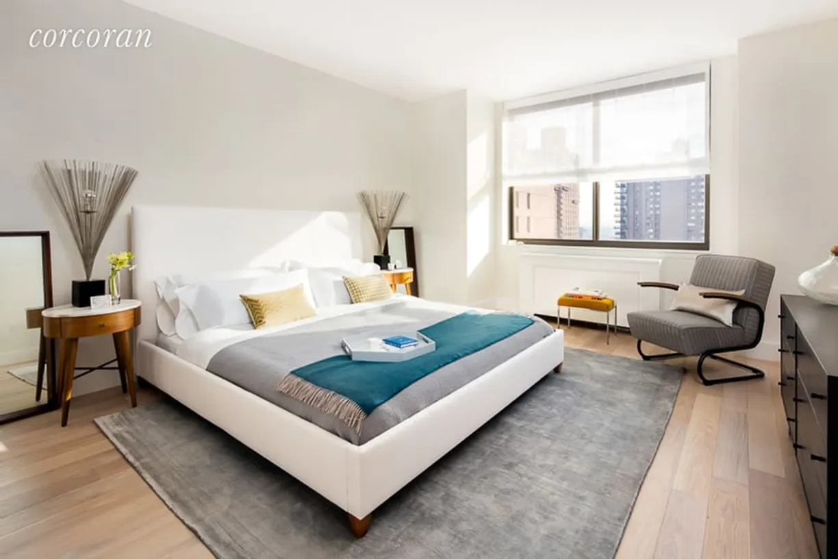 New York City Real Estate | View 389 East 89th Street, 7G | Master bedroom with city views 