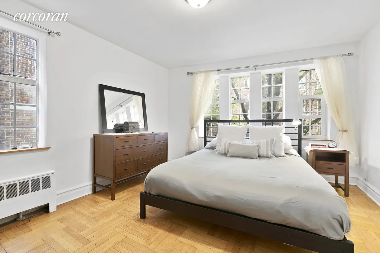 New York City Real Estate | View 116 Pinehurst Avenue, H21 | Sunny corner king-sized master bedroom
