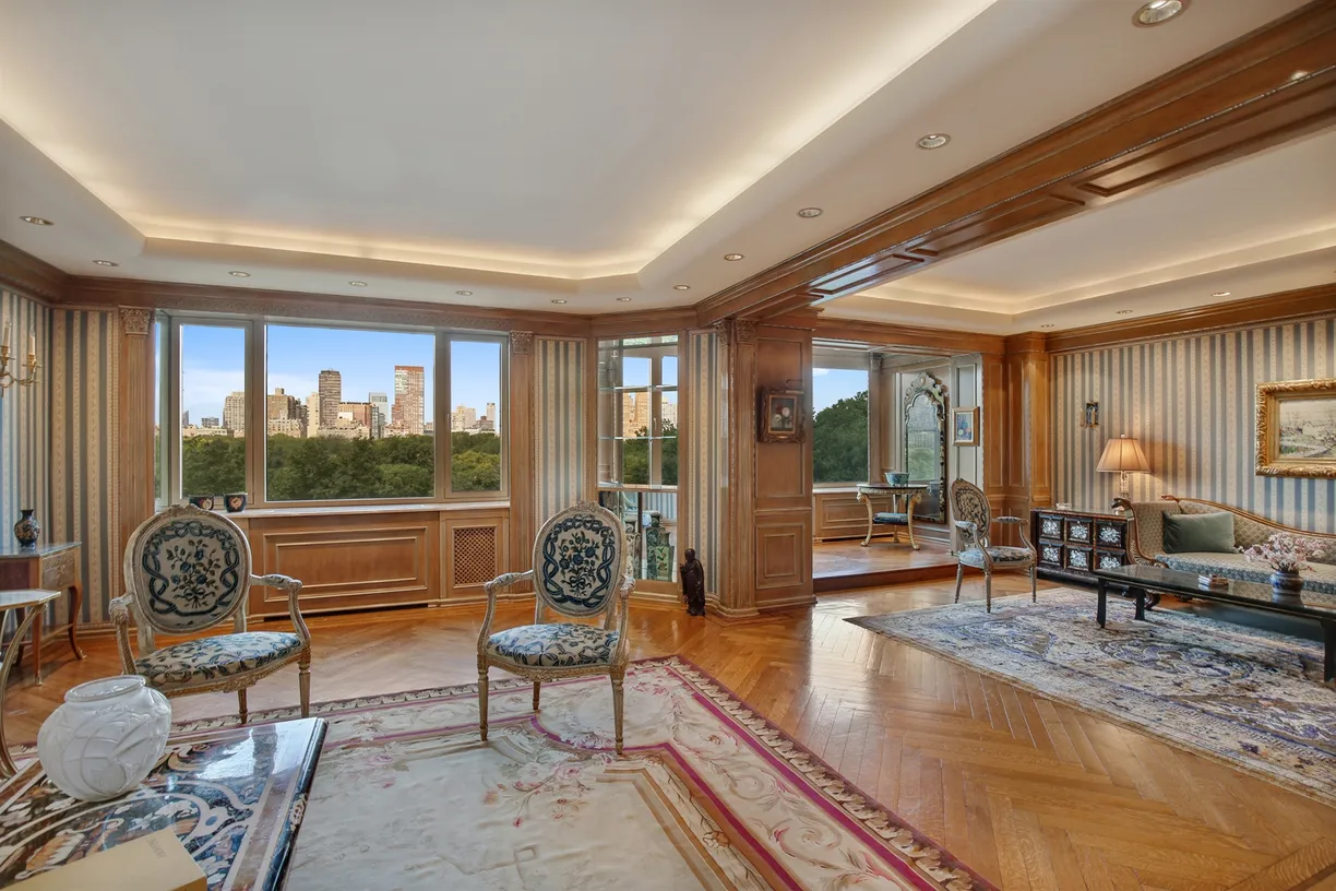New York City Real Estate | View 860 Fifth Avenue, 9/10K | Living Room and Library with captivating views