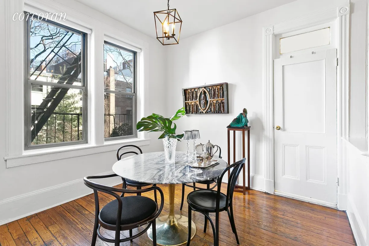 New York City Real Estate | View 331 West 19th Street, 3 | Large dining room overlooking gardens