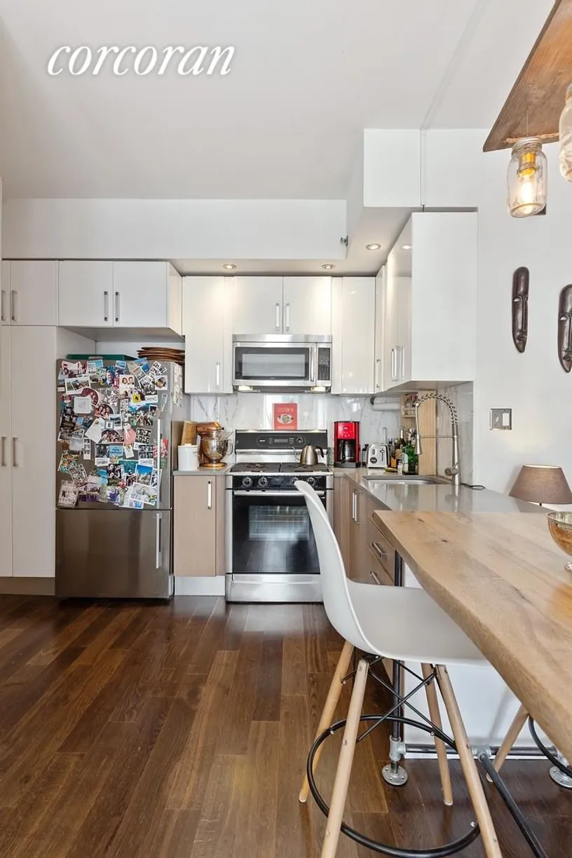 New York City Real Estate | View 100 Maspeth Avenue, 2J | Open Chef's Kitchen with Dining Area