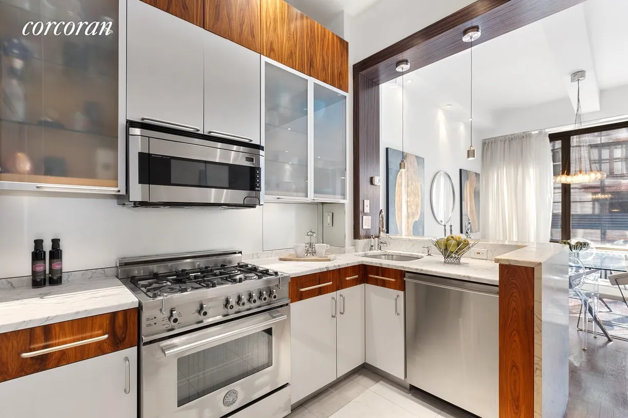 New York City Real Estate | View 21 East 22nd Street, 4F | Kitchen with Breakfast Bar 