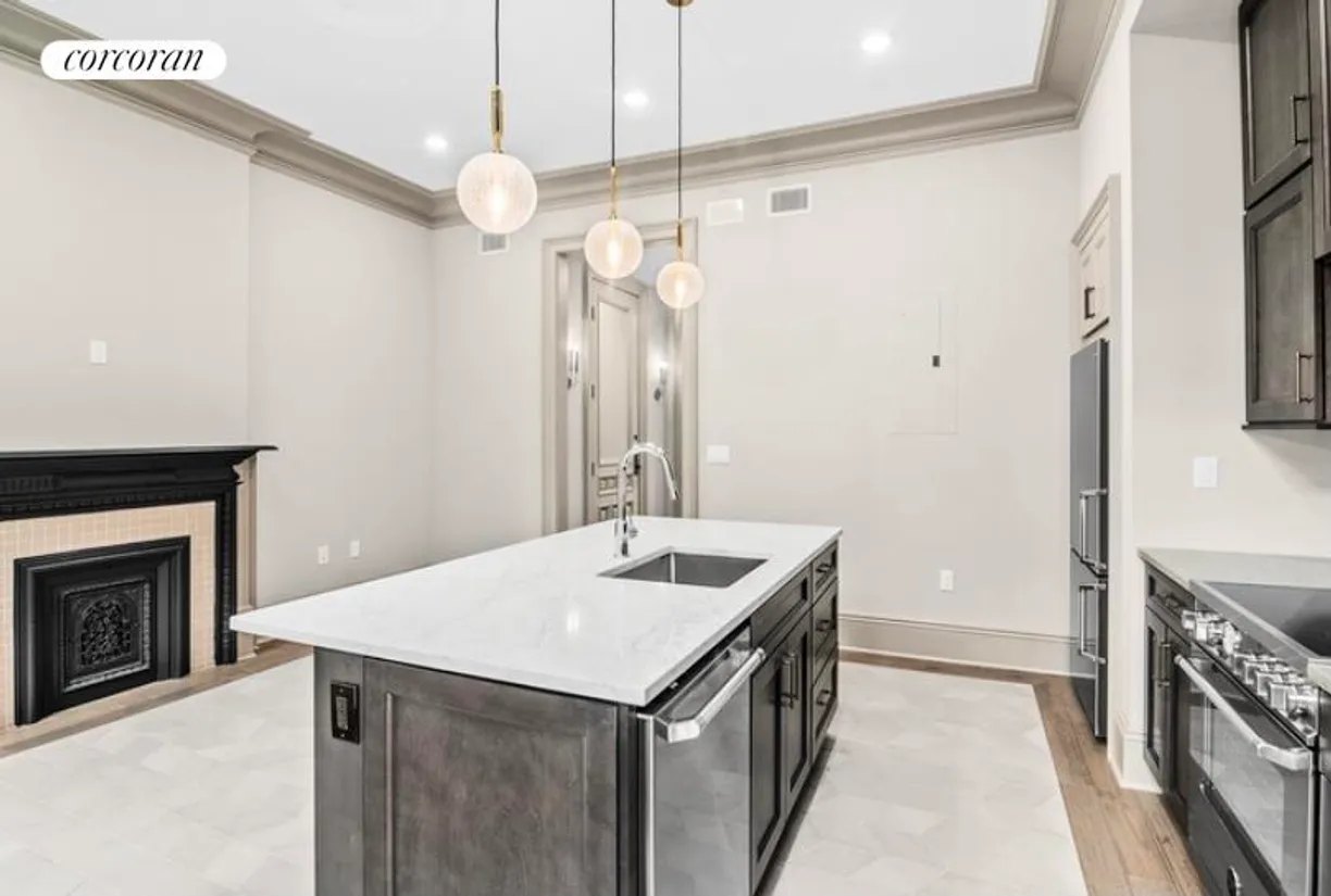 New York City Real Estate | View 522 Monroe Street, 1 | Kitchen with Decorative Fire Place