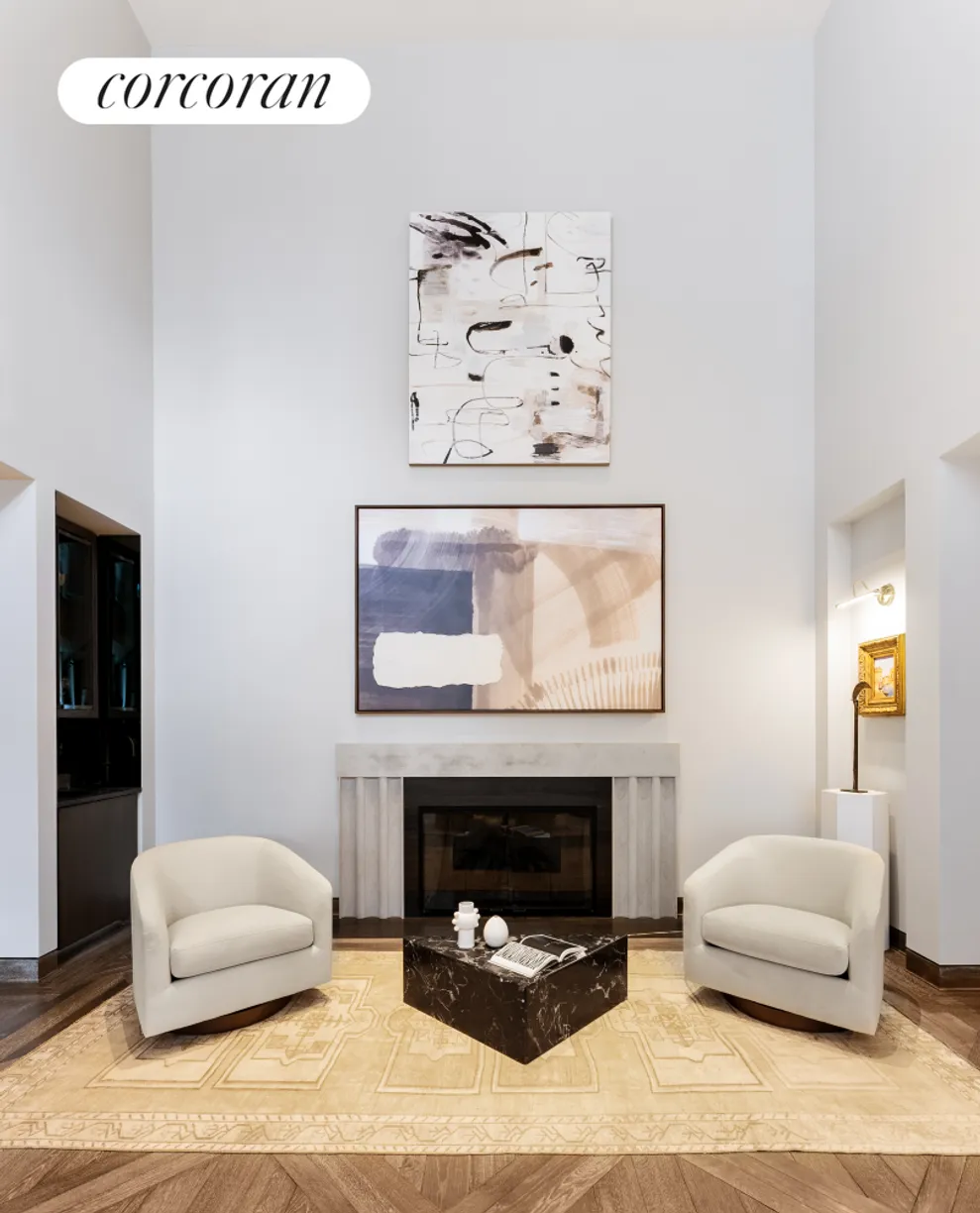 New York City Real Estate | View 111 West 57th Street, 14N | Living Room with Fireplace