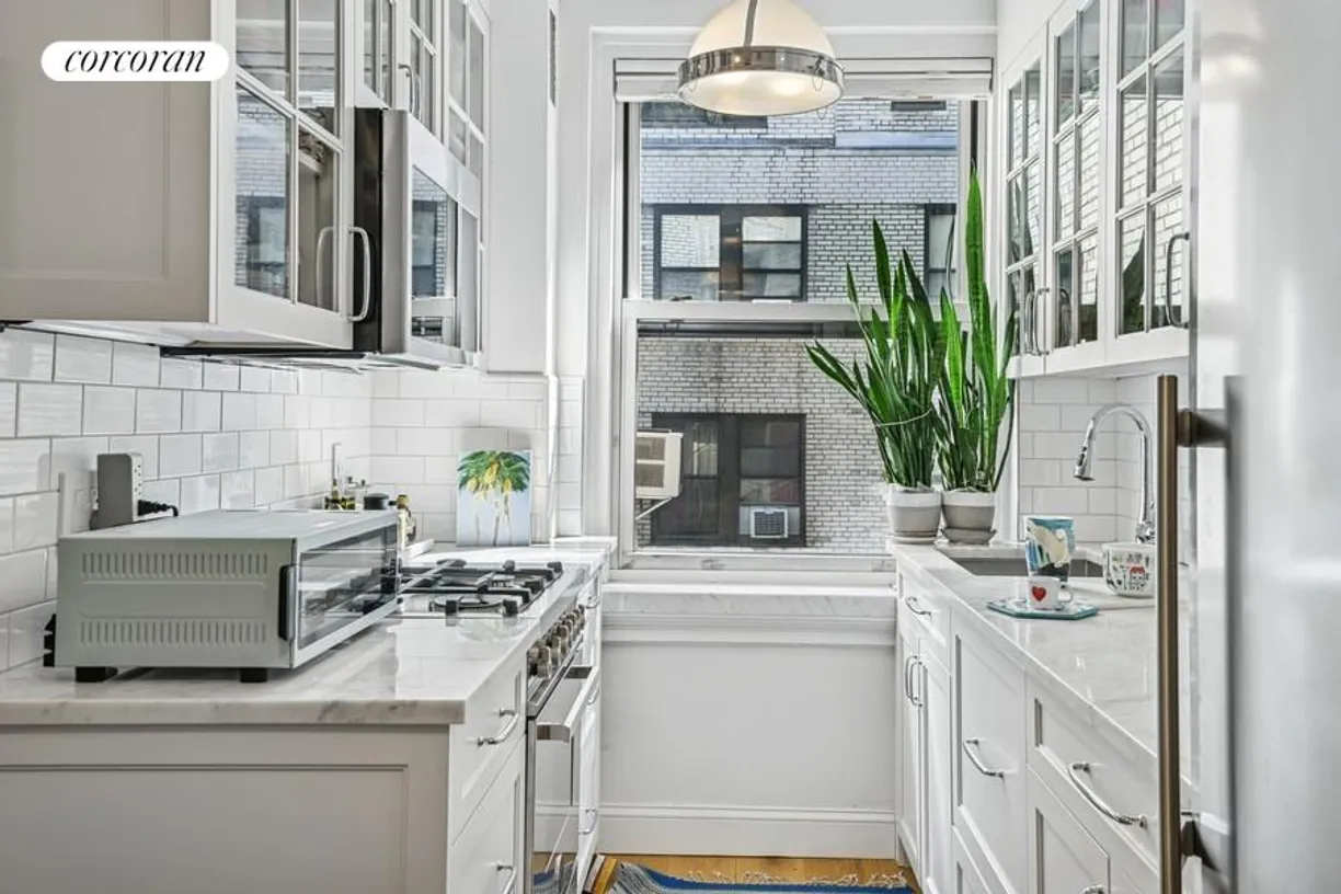 New York City Real Estate | View 215 East 73rd Street, 9G | Renovated Windowed Eat-In Kitchen