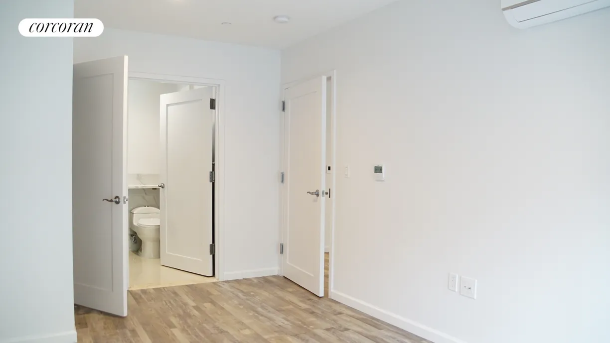 New York City Real Estate | View 39-04 29th Street, 3A | Bedroom with Ensuite Bathroom