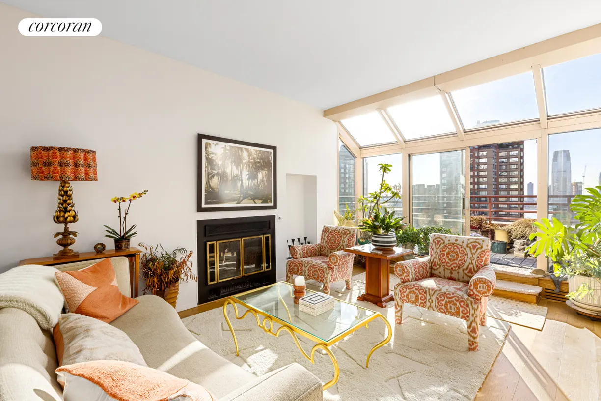 New York City Real Estate | View 250 South End Avenue, PH2B | Living Room,Fireplace,Atrium