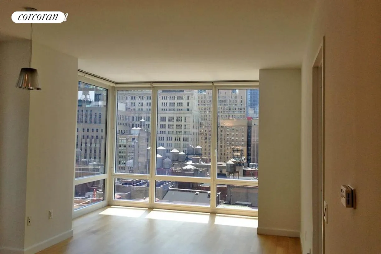New York City Real Estate | View 247 West 46th Street, 1104 | Living area with gorgeous view
