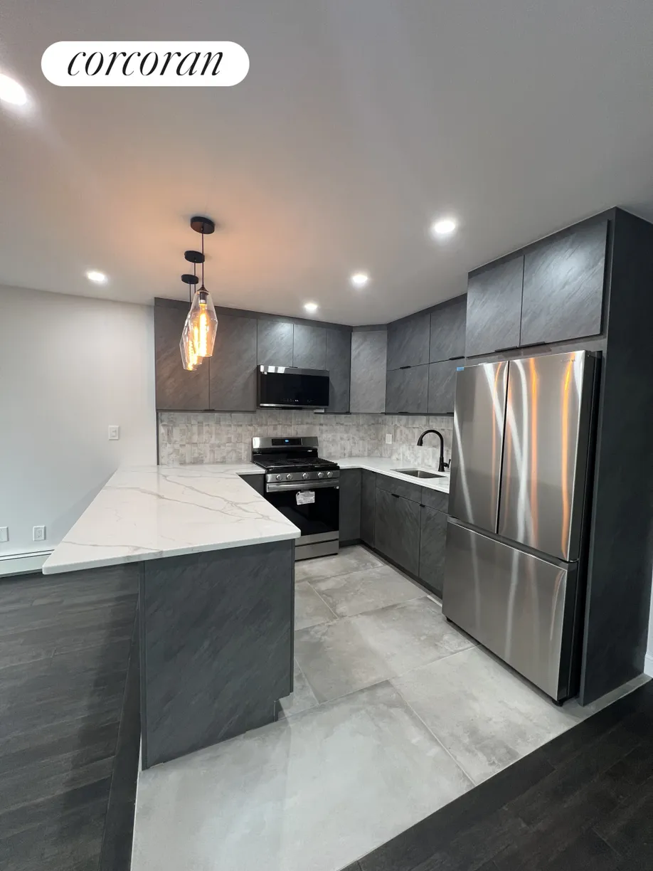 New York City Real Estate | View 59-90 58th Avenue, 3 | 3 Beds, 2 Baths