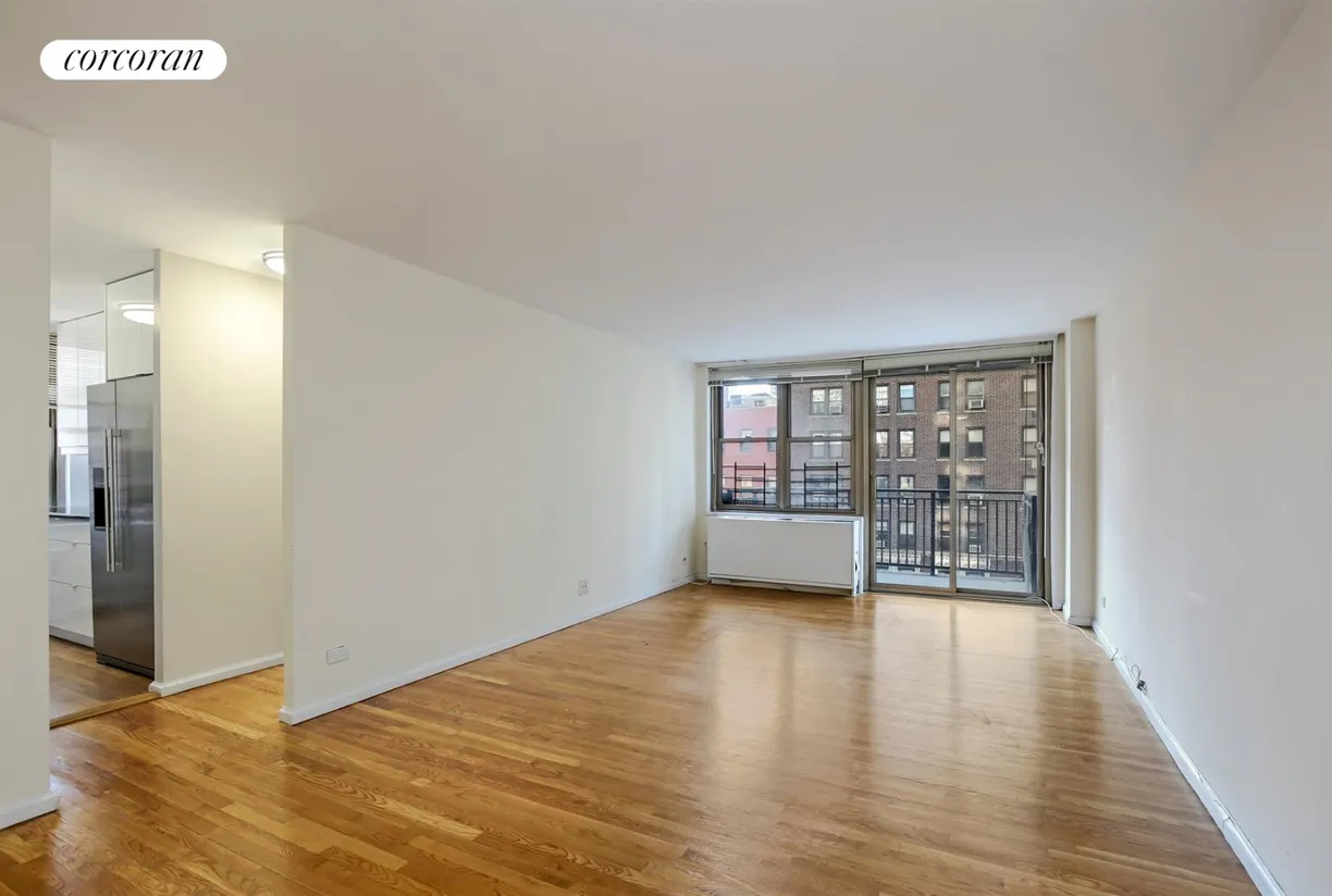 New York City Real Estate | View 301 East 79th Street, 5J | living room & balcony