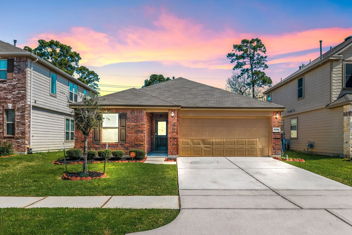 Houston Suburbs Real Estate | View 14238 Persimmon Woods Drive | 4 Beds, 2 Baths
