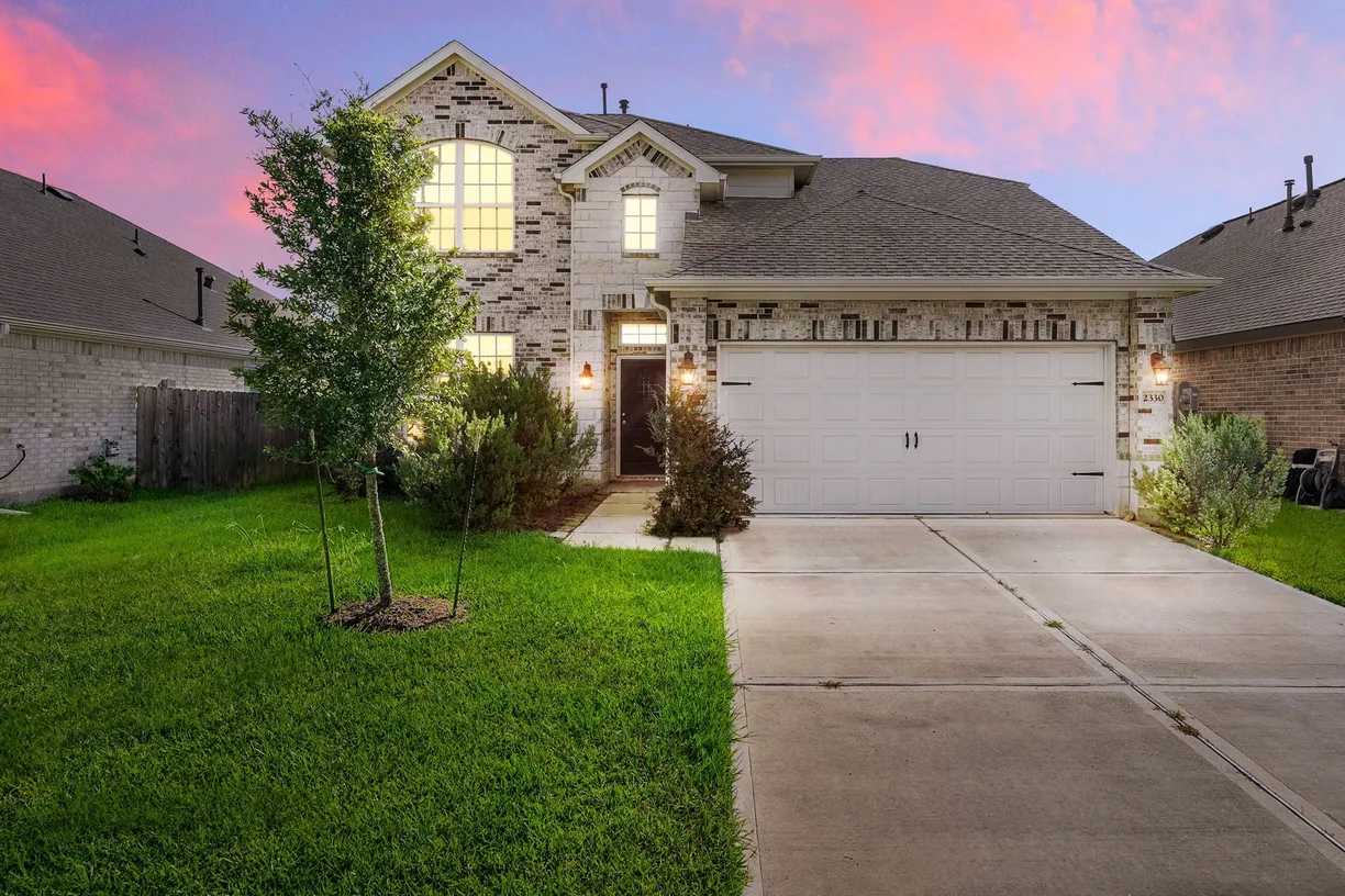 Houston Suburbs Real Estate | View 2330 Ocean Pass Lane | 4 Beds, 2 Baths