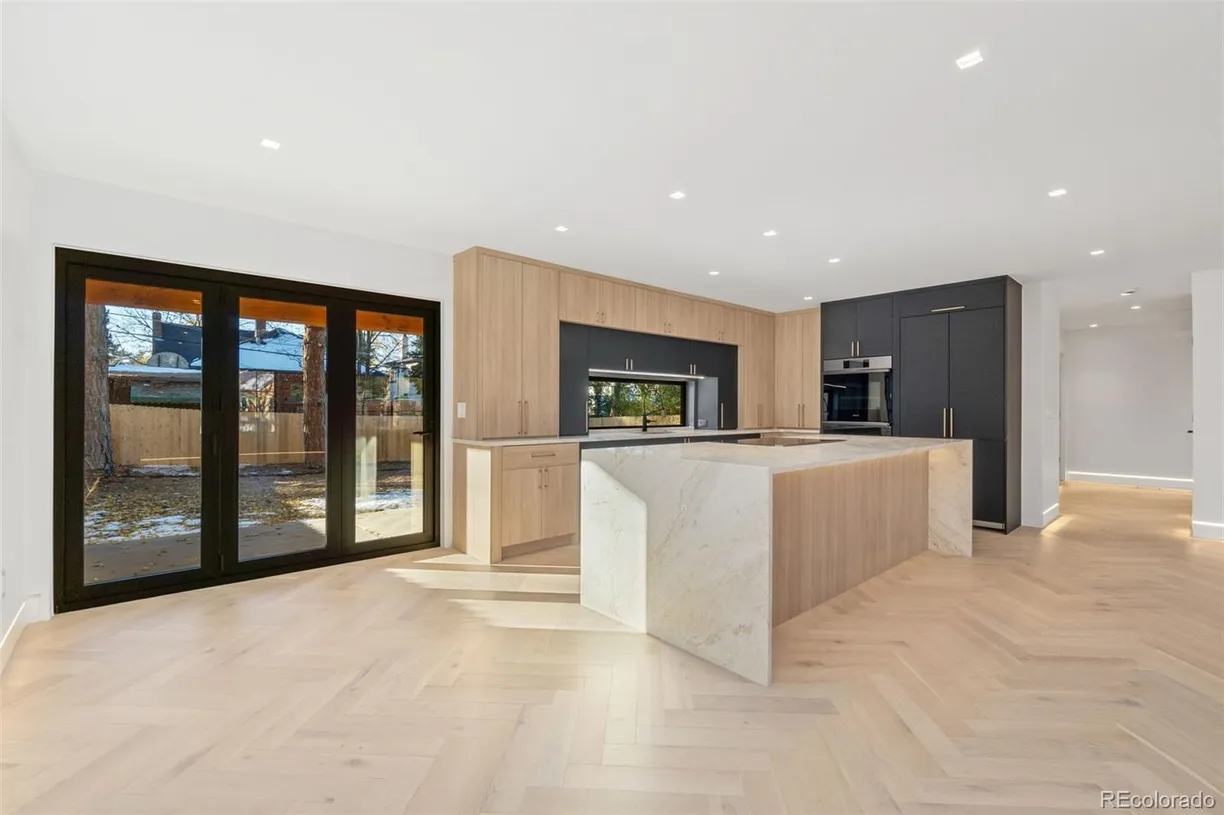 Denver Real Estate | View 715 Glencoe Street | 4 Beds, 3 Baths