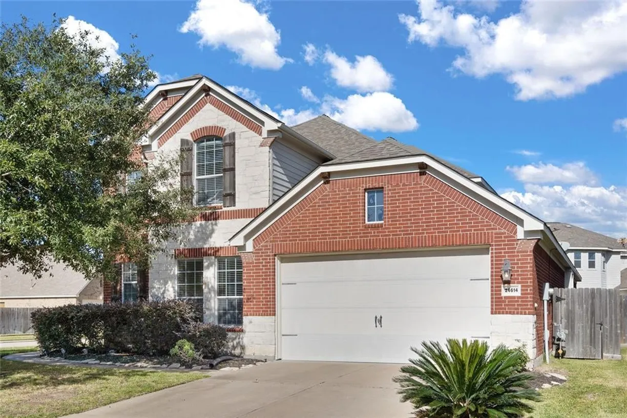 Houston Suburbs Real Estate | View 24614 Cabin Line Lane | 4 Beds, 3 Baths