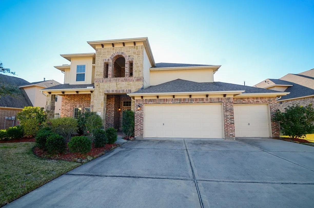 Houston Suburbs Real Estate | View 9206 Flathead Range Court | 4 Beds, 3 Baths
