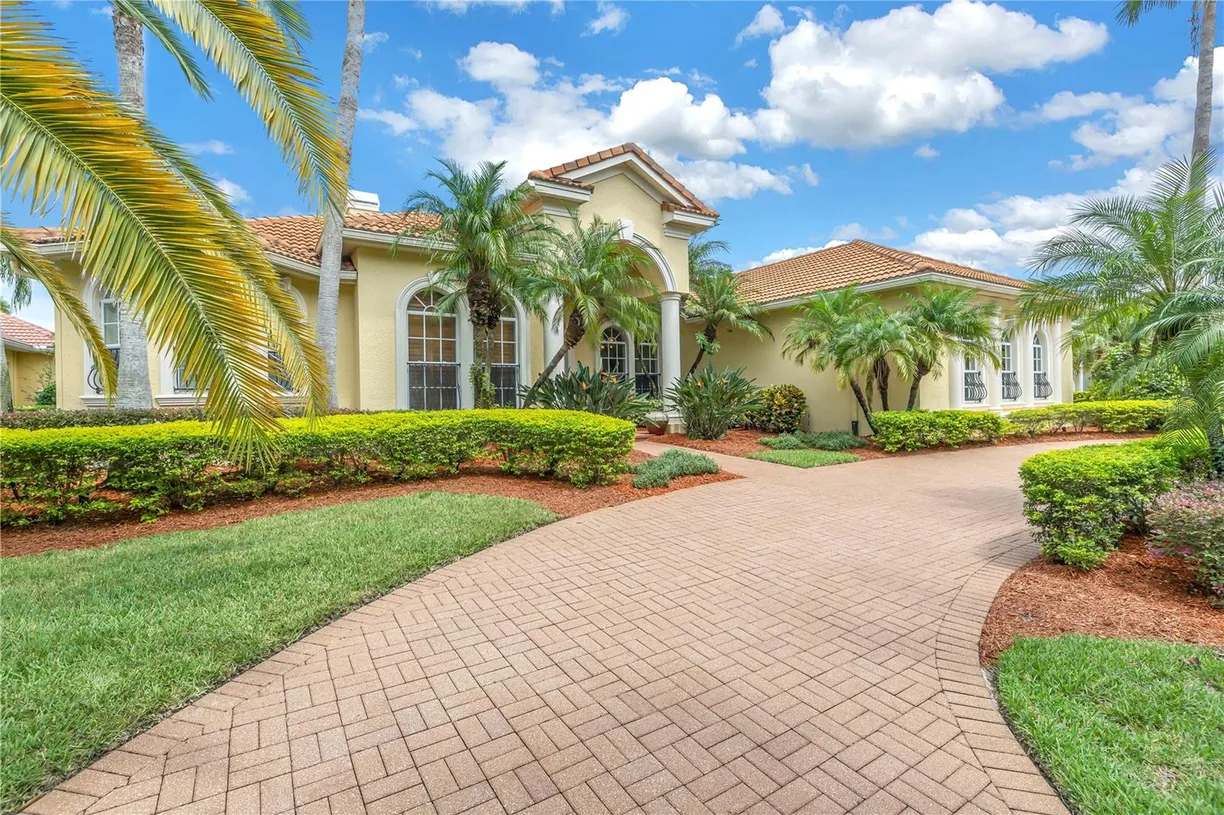 Sarasota/St. Petersburg Real Estate | View 9818 Tree Tops Lake Road | 4 Beds, 3 Baths