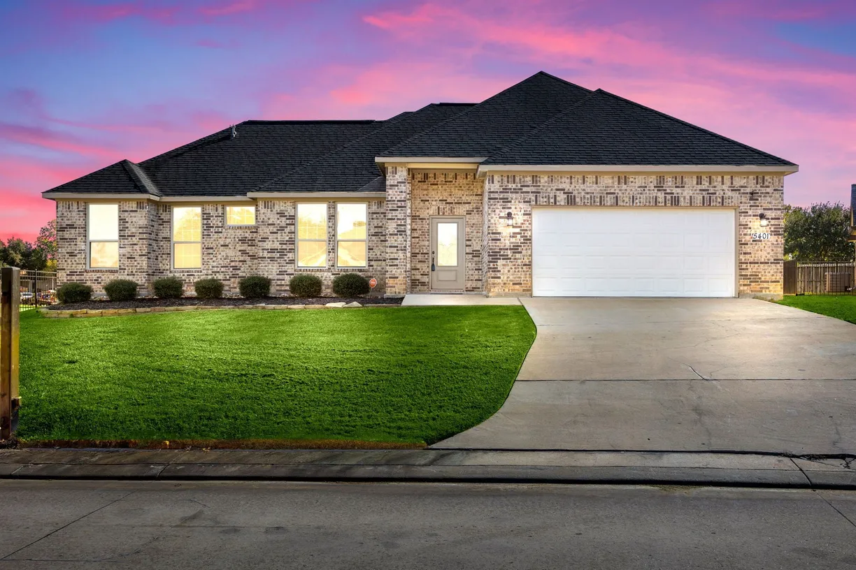 Houston Suburbs Real Estate | View 5401 Zephyr Lane | 4 Beds, 3 Baths