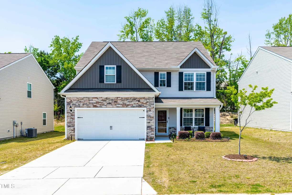Raleigh, NC Real Estate | View 224 Brisk Drive | 4 Beds, 2 Baths